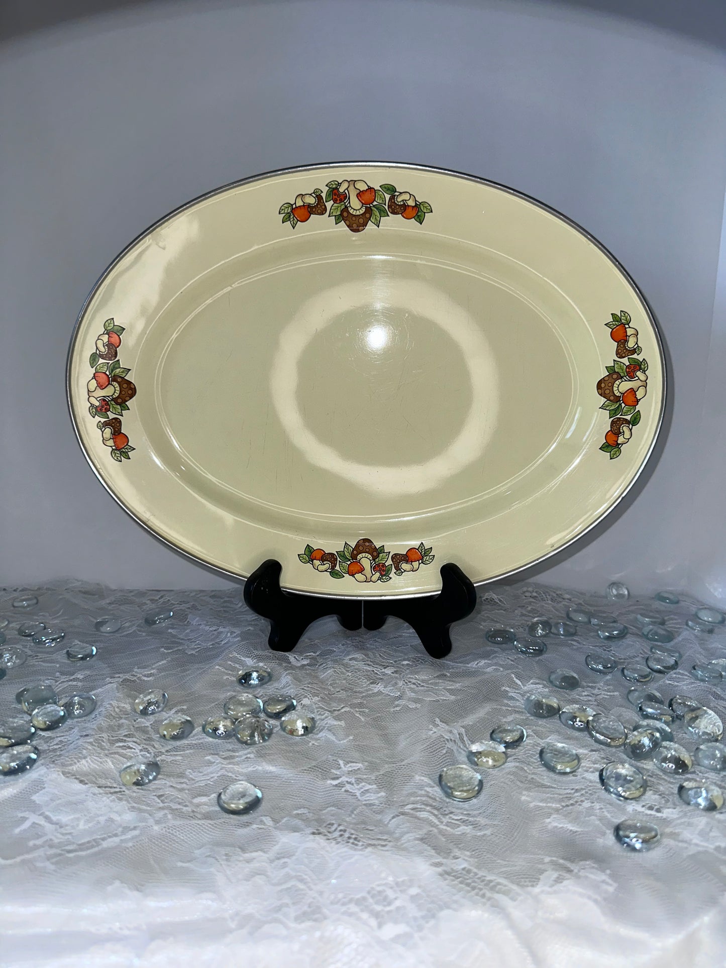 Vintage enamel platter with mushrooms