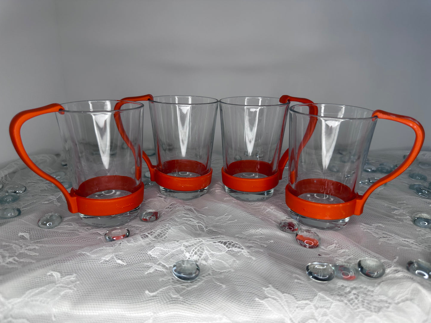 Set of 4 vintage glass cups with plastic handles