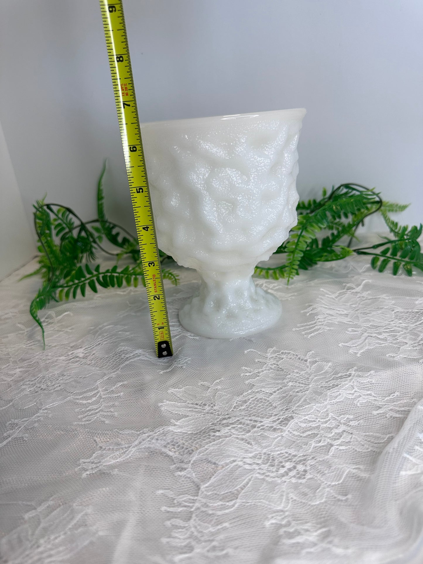 E.O. Brody milk glass vase