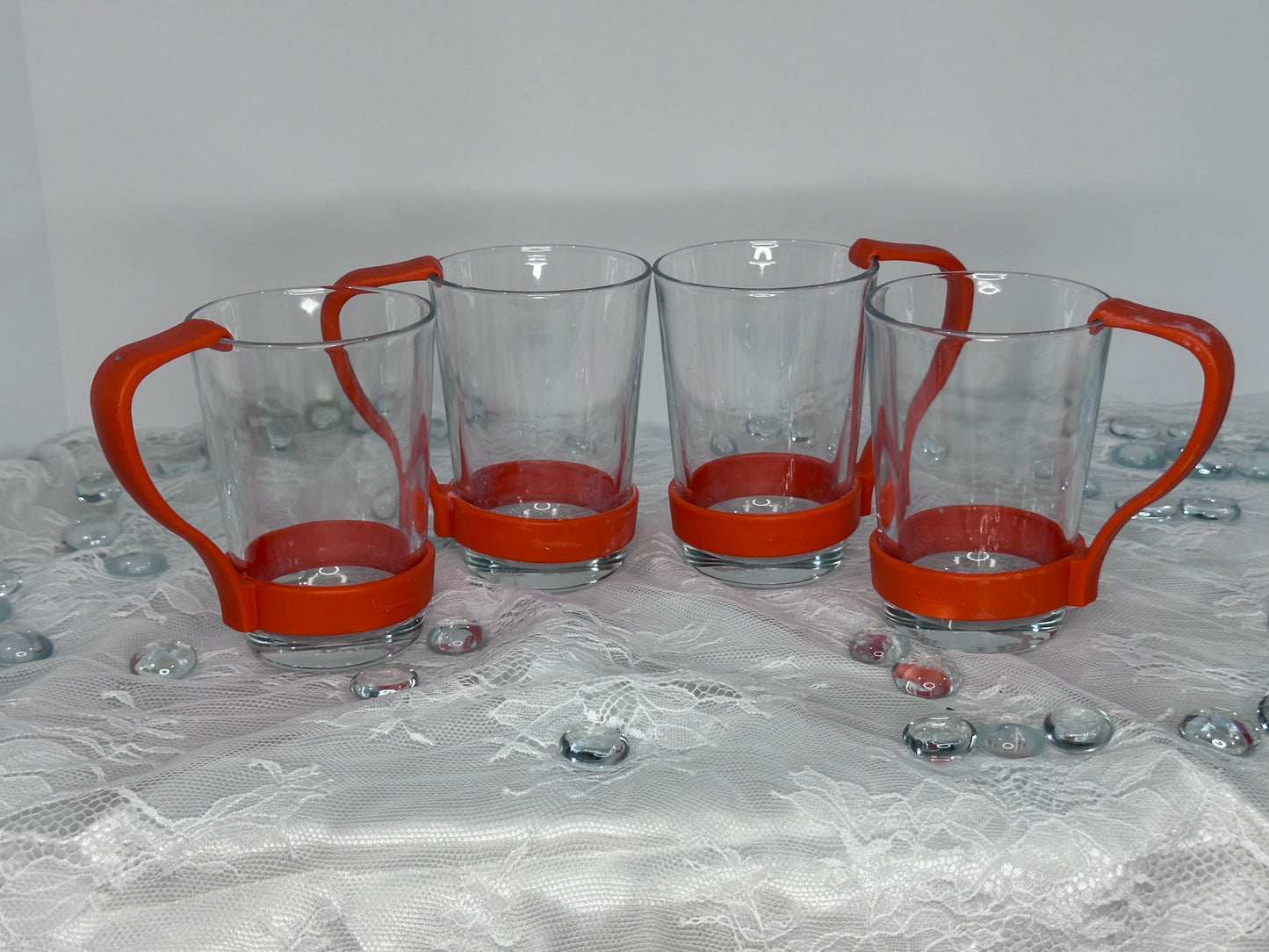 Set of 4 vintage glass cups with plastic handles